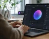 A person working on microanimation software on a laptop